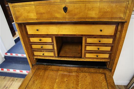 A Biedermier satinbirch secretaire abbatant, W.2ft 11.5in.